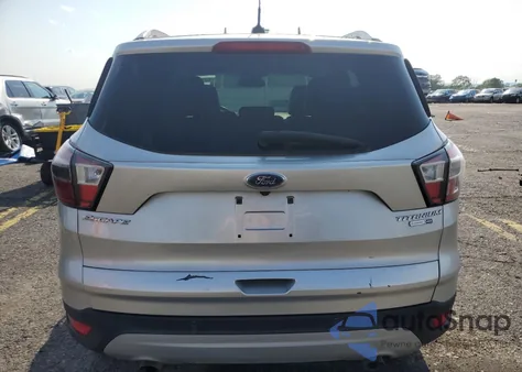 2017 Ford Escape Titanium z USA, uszkodzony, nr VIN 1FMCU9J98HUA58277